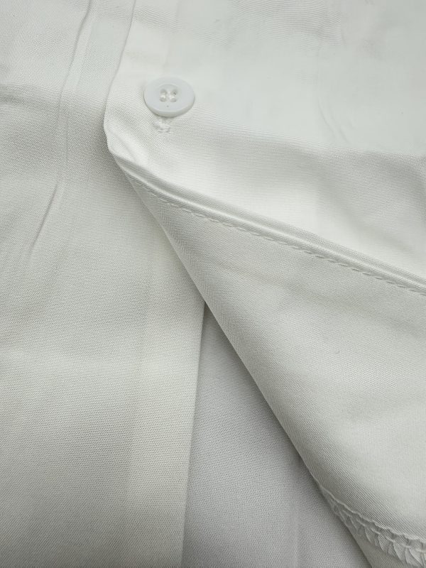 new products in 2025, a 2pcs set of summer simple men's short sleeved shirt and long pants. the white short sleeved shirt is paired with long pants in the same color system. the style is casual and elegant, suitable for daily outings.