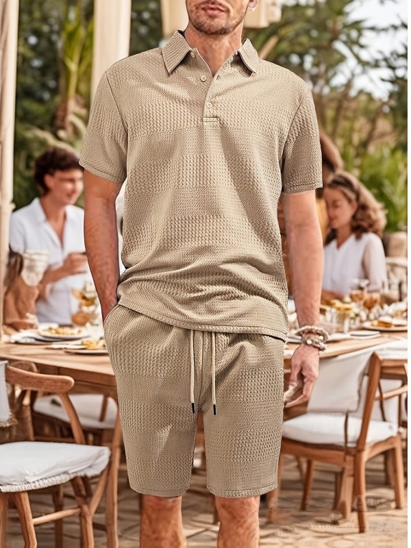 the short sleeved polo collar top is classic while maintaining a sense of style. its main body is paired with a unique texture, exuding a high end feel in its simplicity. the shorts in the same color scheme come with a drawstring design