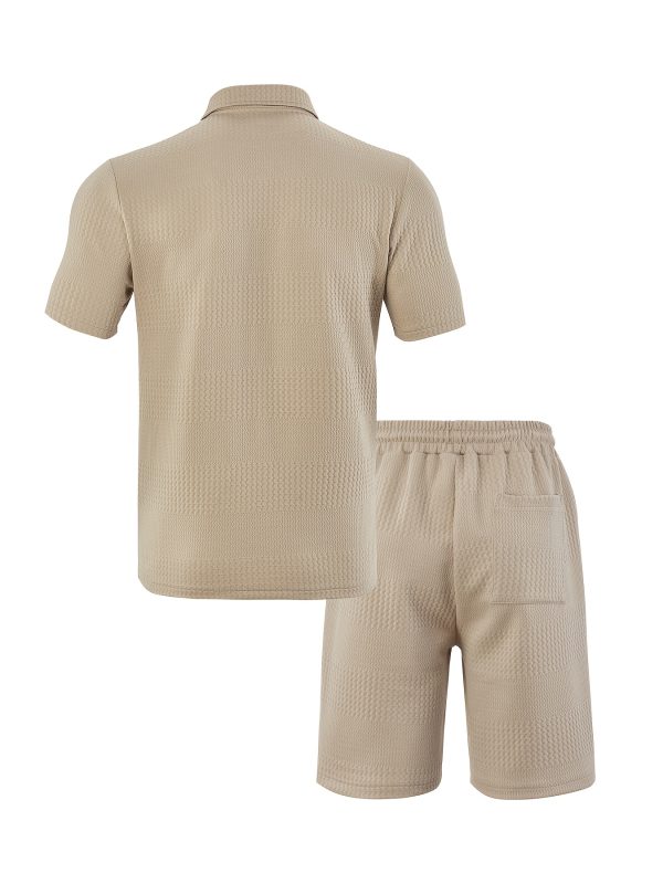 the short sleeved polo collar top is classic while maintaining a sense of style. its main body is paired with a unique texture, exuding a high end feel in its simplicity. the shorts in the same color scheme come with a drawstring design